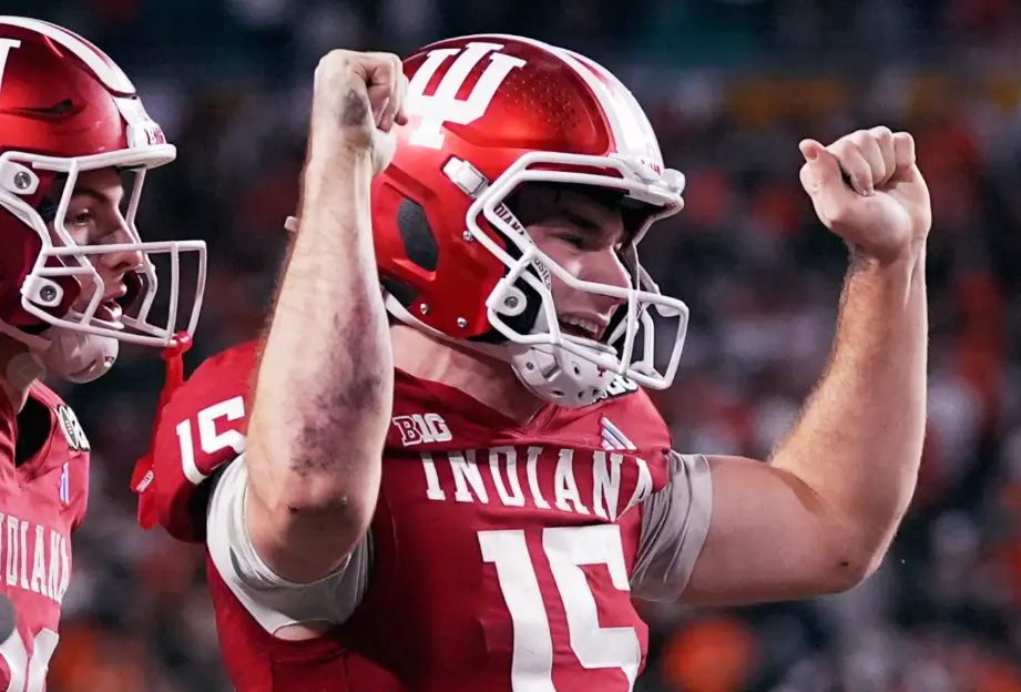 Indiana completes undefeated season and wins first national title, beating Miami 27-21 in CFP final