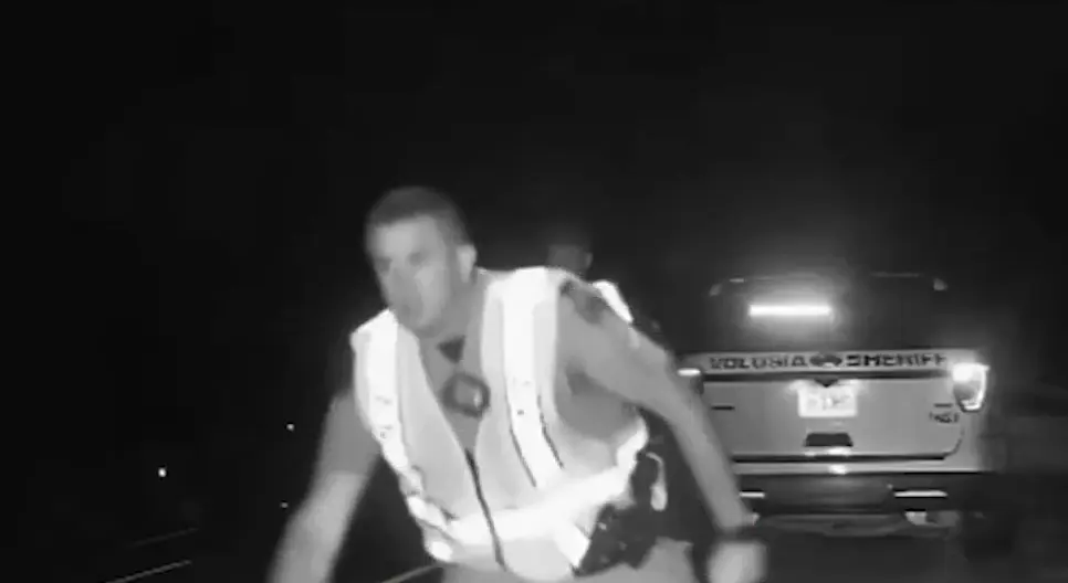 Dashcam video shows Florida state trooper, deputy nearly hit by out-of-control SUV in I-95