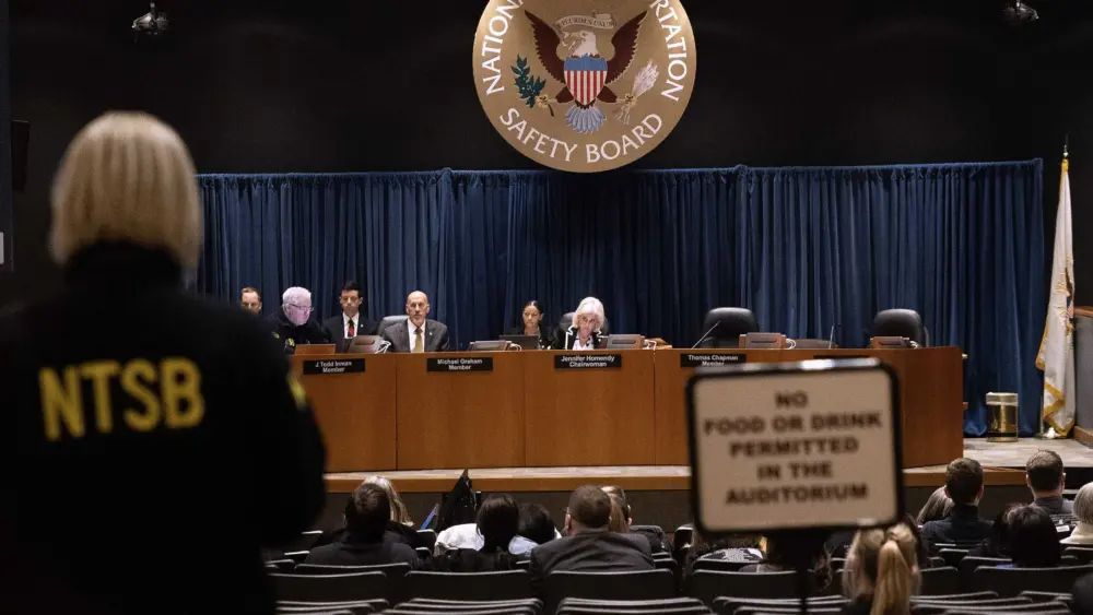 Investigators say systemic failures led to deadly midair plane crash