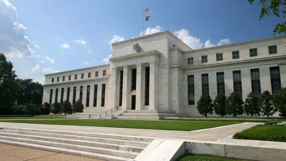 Federal Reserve holds interest rates steady amid political scrutiny