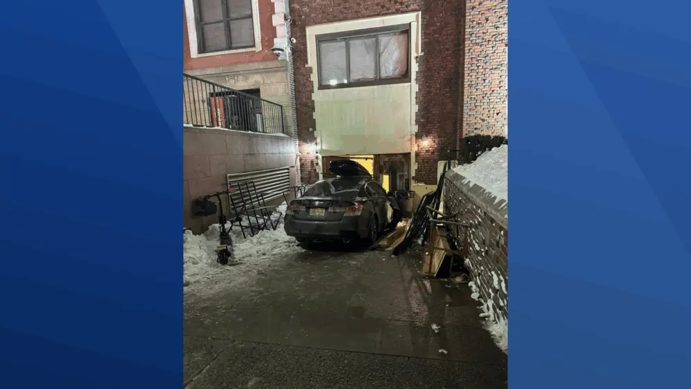 Car rams into Chabad headquarters in New York City, damaging doors