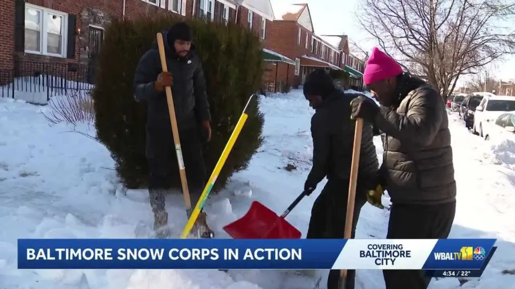 'It's a fun job': Neighbors help rid sidewalks of snow and ice for free