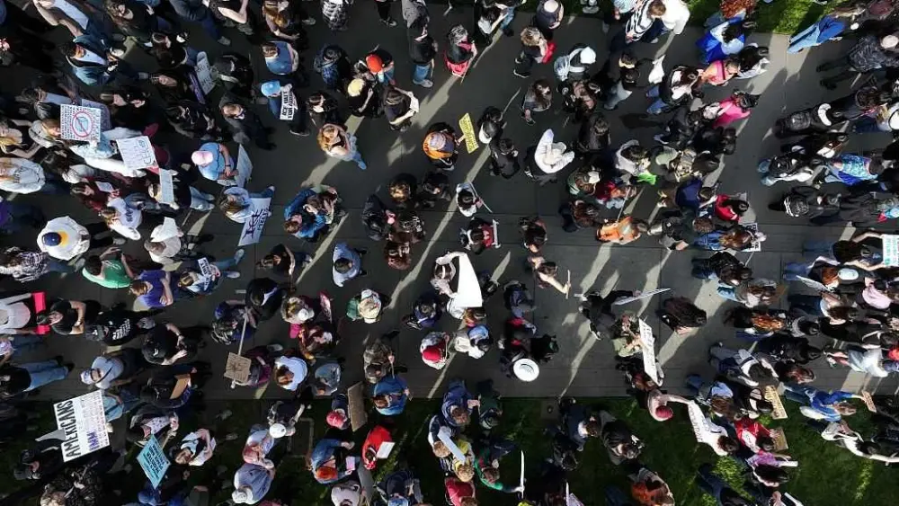 Protesters close schools and stores during a nationwide strike against Trump's immigration policies