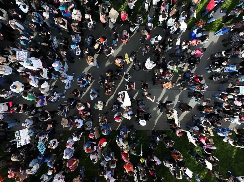 Protesters close schools and stores during a nationwide strike against Trump's immigration policies