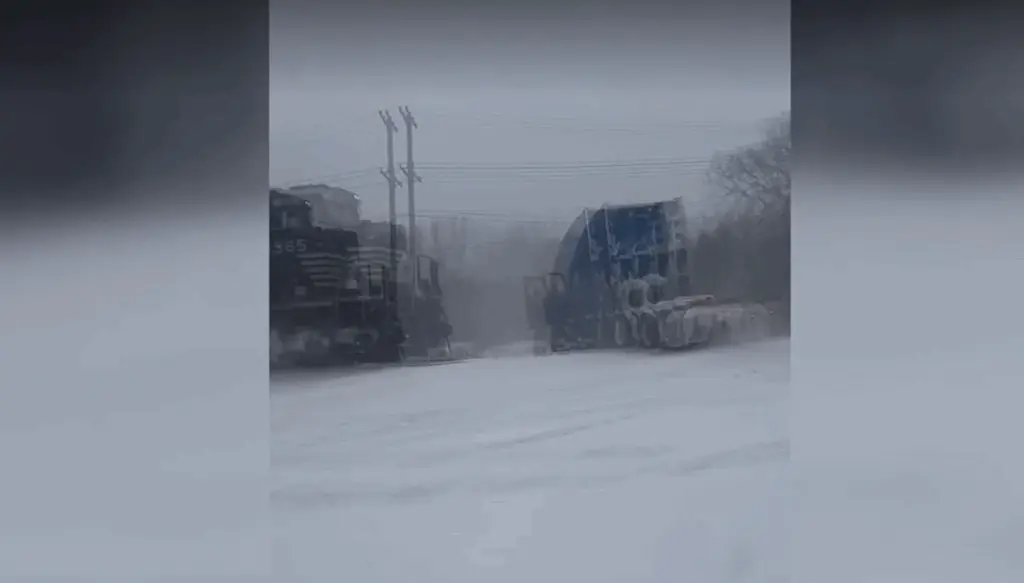 Frightening video shows truck driver escape cab before it's smashed by train in North Carolina