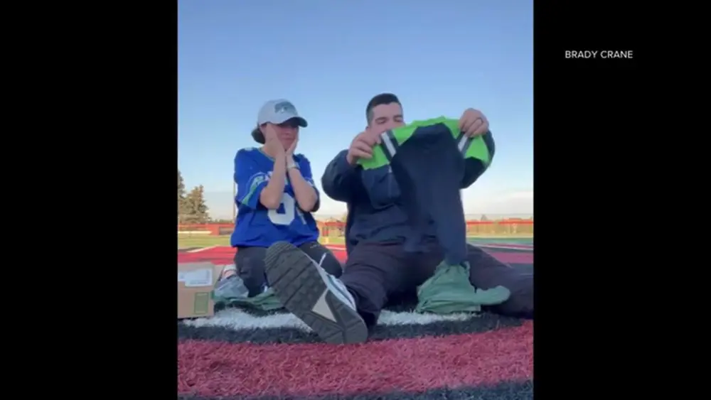 VIDEO: Seahawks and Patriots loyalties collide as couple expects Super Bowl baby