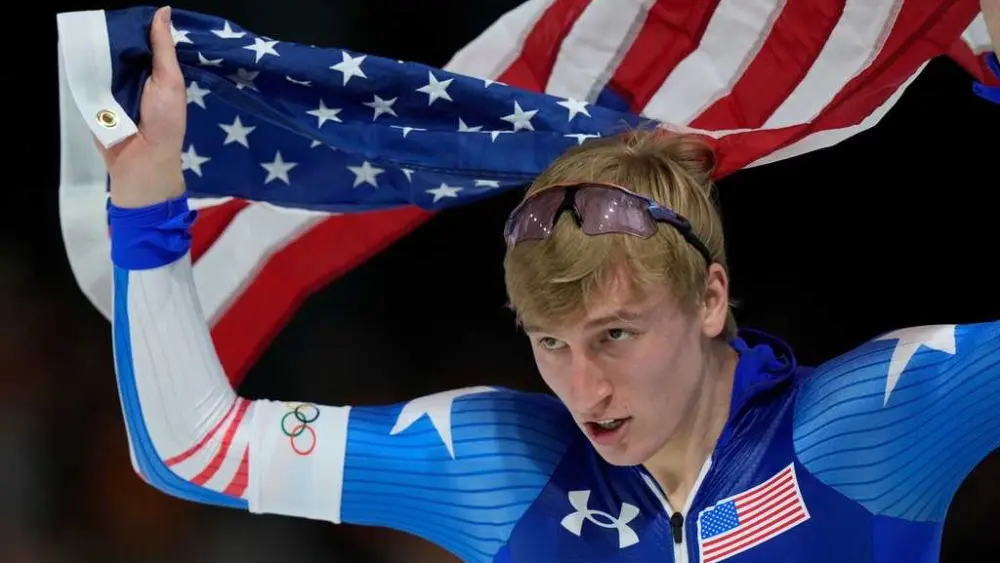 US speedskater Jordan Stolz wins the 1,000 meters gold in an Olympic-record time