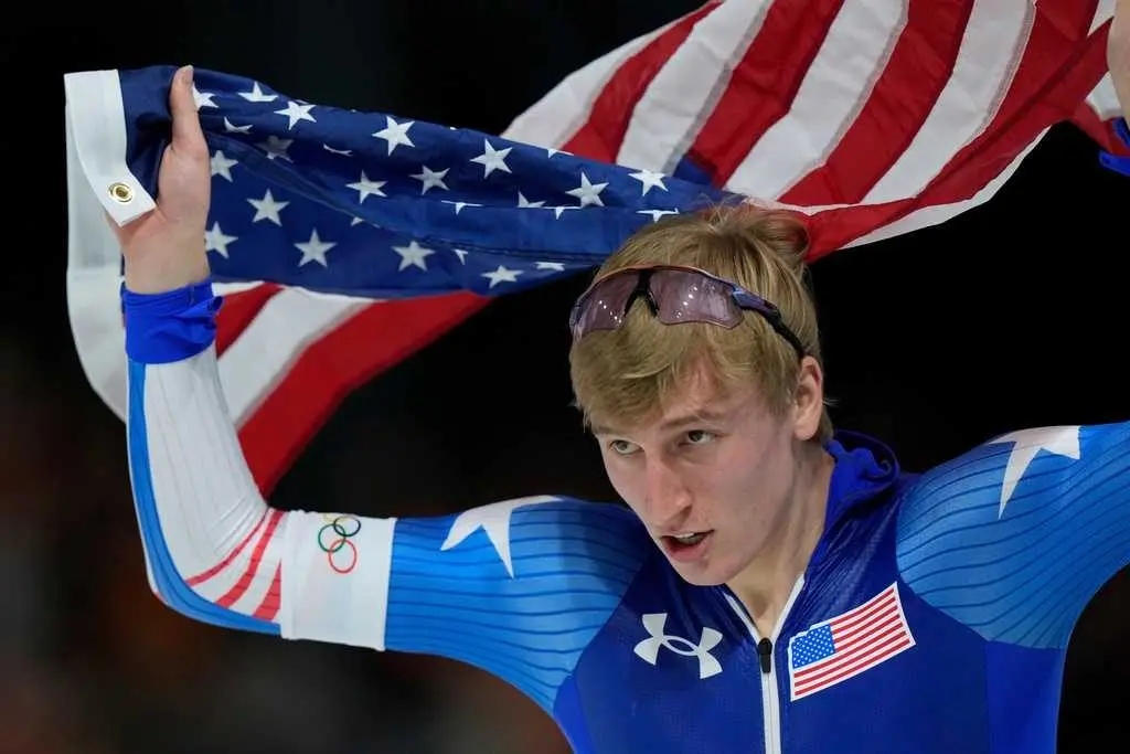 US speedskater Jordan Stolz wins the 1,000 meters gold in an Olympic-record time