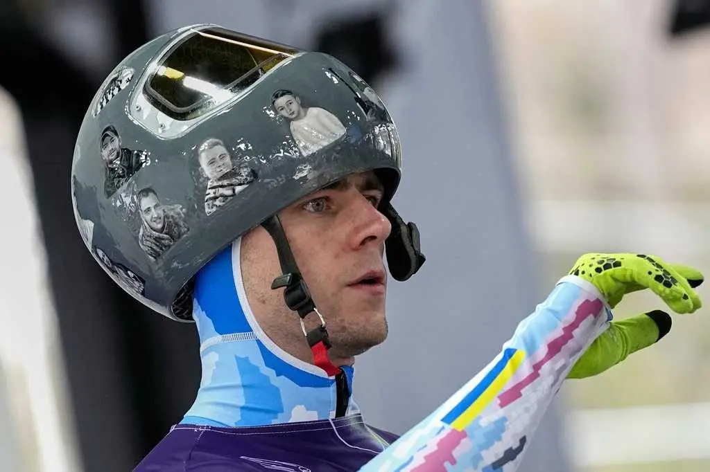 Ukrainian athlete disqualified from Winter Olympics over banned helmet honoring war dead