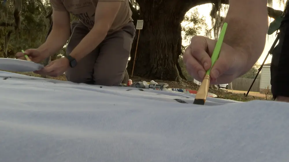 Neighbors host picnic under saved live oak on Little Neck Road