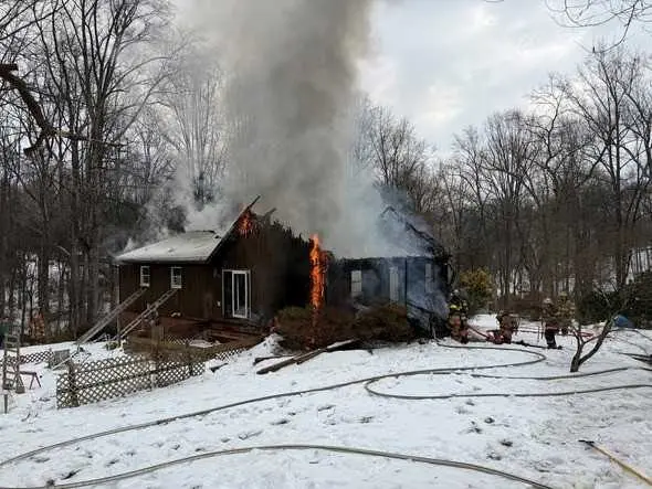 Amazon driver saves 84-year-old woman from burning home