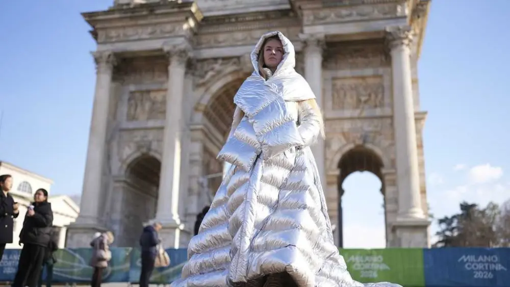 Russian woman carried Ukraine placard at Winter Olympics Opening Ceremony
