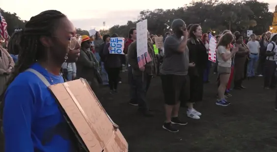 Over 200 protest in Forsyth Park following death of teacher in ICE chase crash