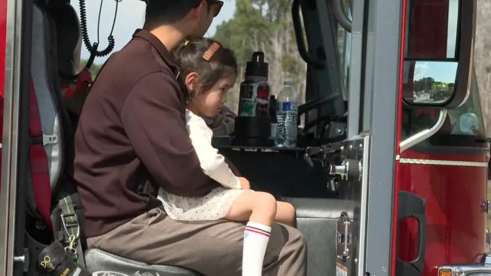 Kids get up close with firetrucks, police cars at Pooler's Truck Town