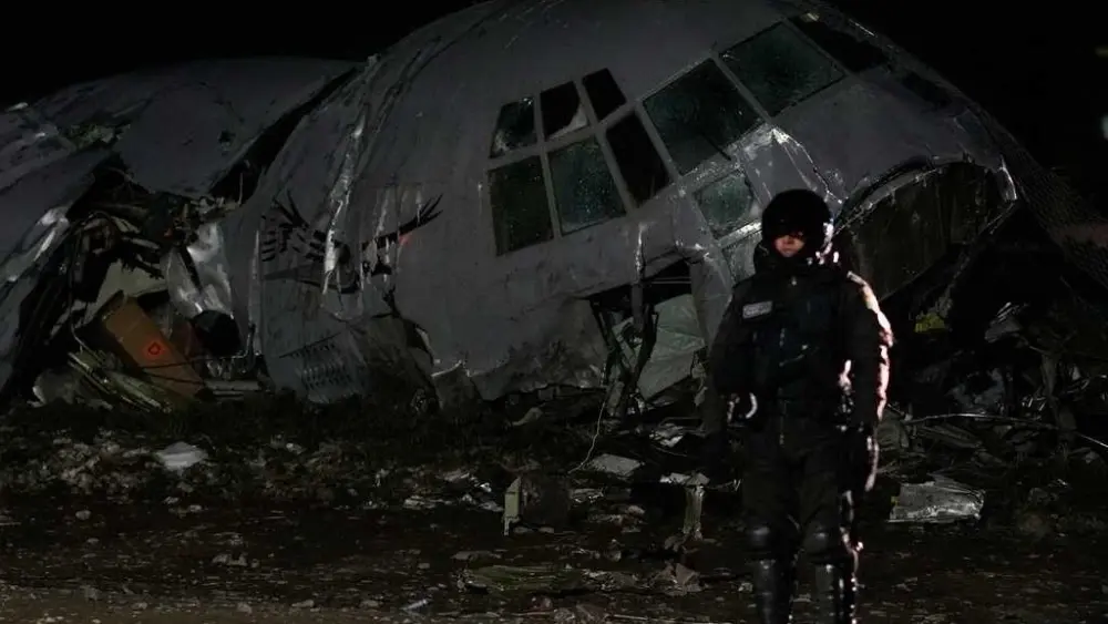 Cargo plane carrying money crashes near Bolivia's capital, killing at least 15 people, official says