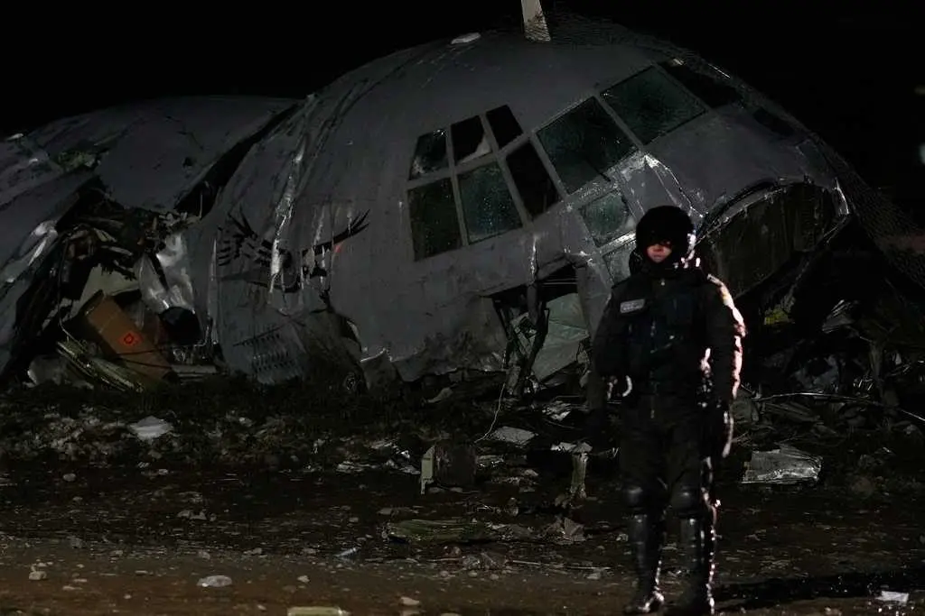Cargo plane carrying money crashes near Bolivia's capital, killing at least 15 people, official says