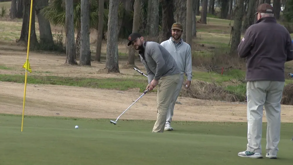 Players tee off for St. Patrick's Day Parade fundraiser