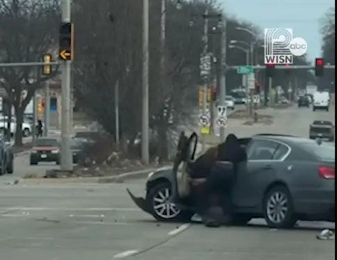 WATCH: Stolen car victim confronts thief in middle of street, police say