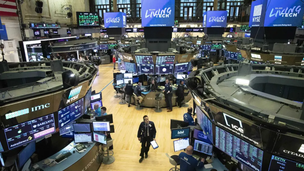 Stocks fall after oil prices spike near a 2-year high and reports suggest a slowing US economy