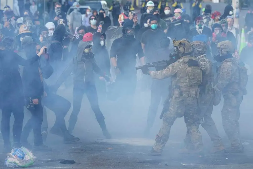 Judge in Oregon limits federal officers' tear gas use