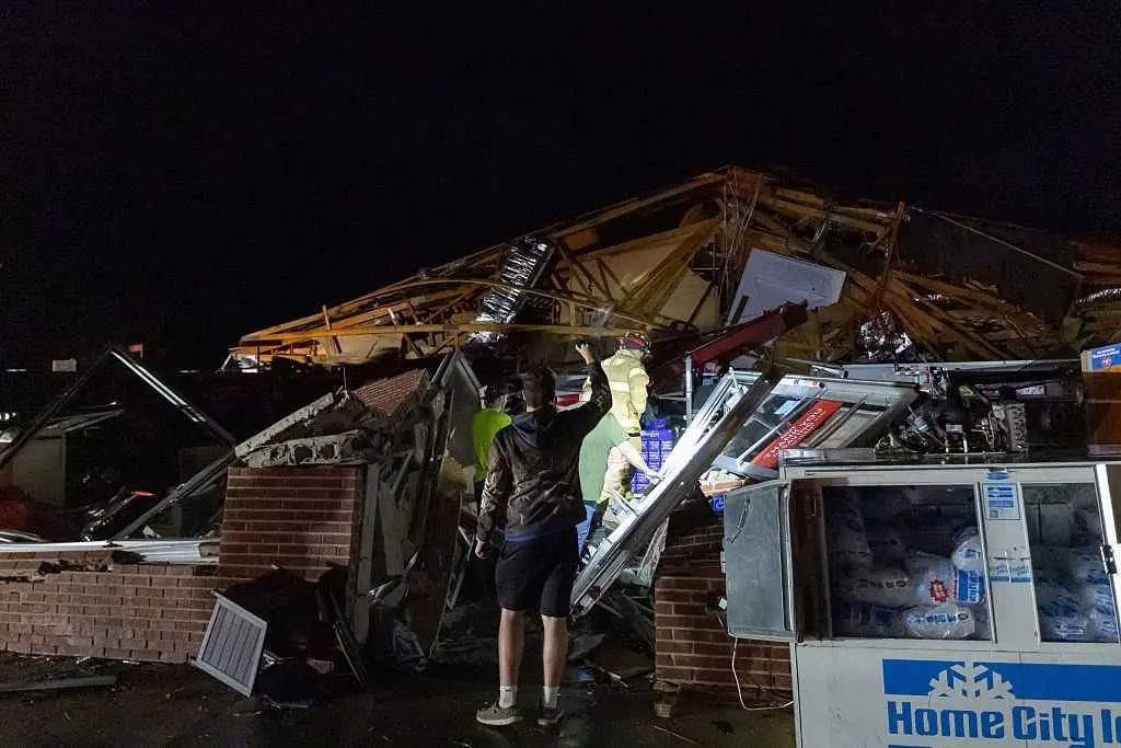 Severe storms whip up tornadoes in Illinois and Indiana, leveling homes
