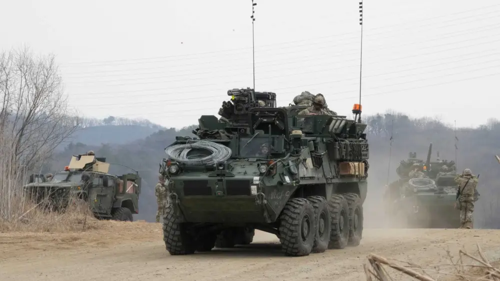 North Korea fires about 10 missiles toward sea in show of force, Seoul says