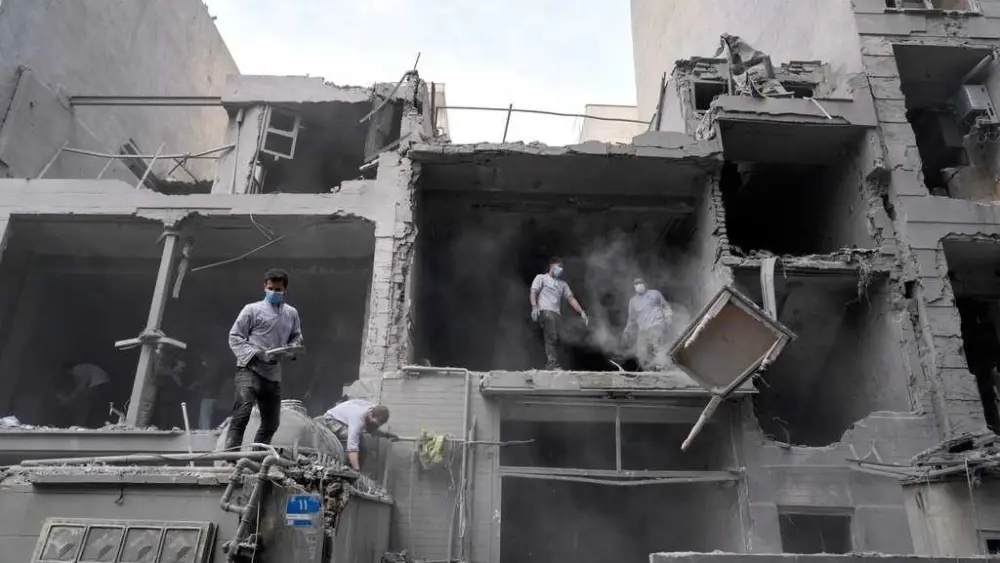 Iran escalates attacks on Middle East neighbors as Israel strikes Beirut