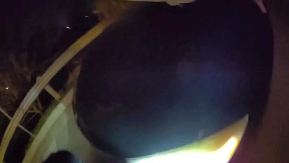 'Drive! Drive! Drive!': Video shows officer riding on hood of stranger's car during chase