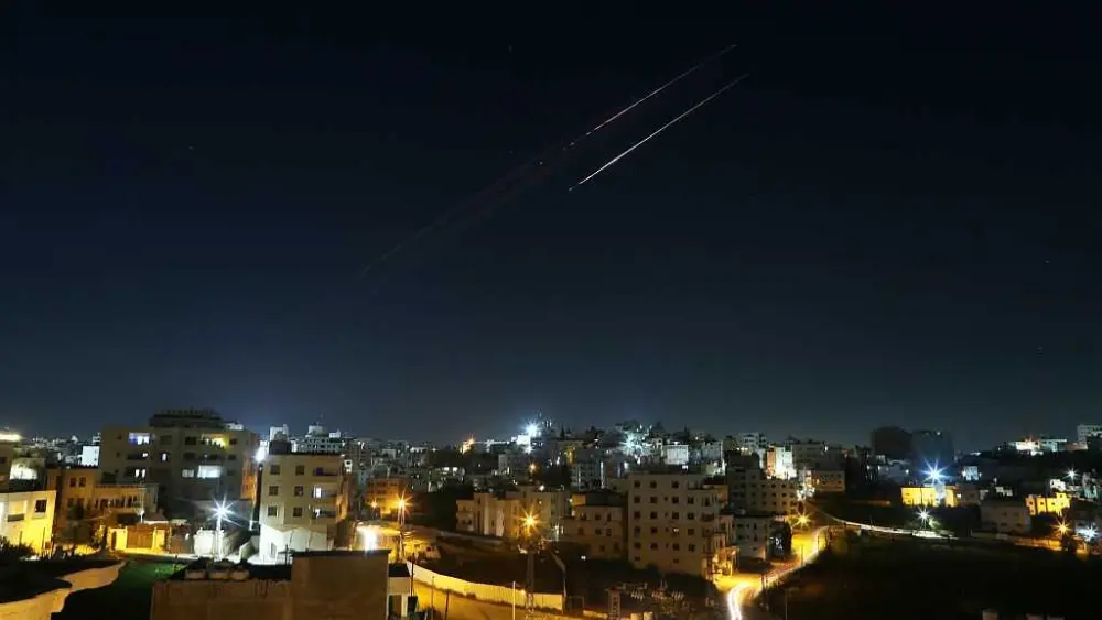 Iran lashes out with attacks on Israel and Gulf neighbors as Israel hits Beirut