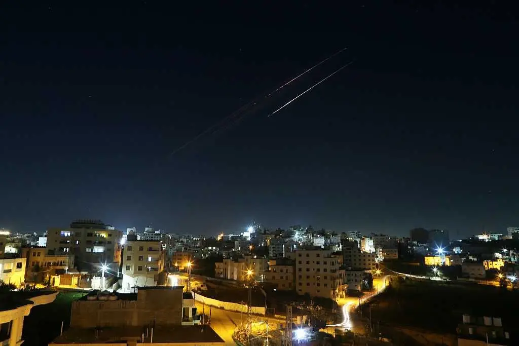 Iran lashes out with attacks on Israel and Gulf neighbors as Israel hits Beirut