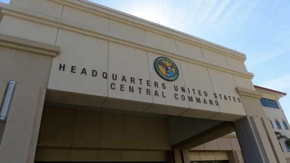 Brother and sister are charged after an explosive device was found outside a Florida Air Force base