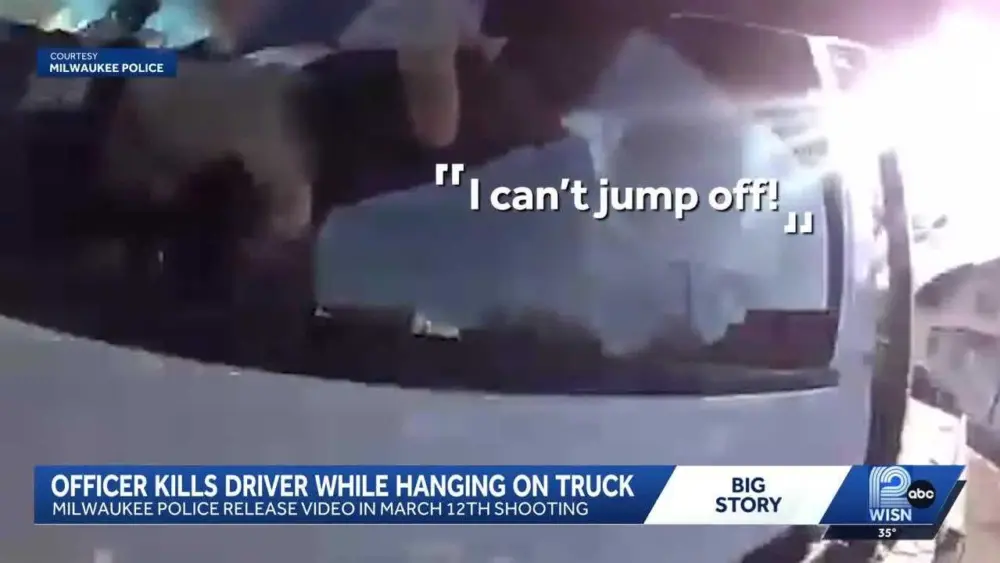 WATCH: Body camera shows Wisconsin officer hang from moving truck before deadly shooting