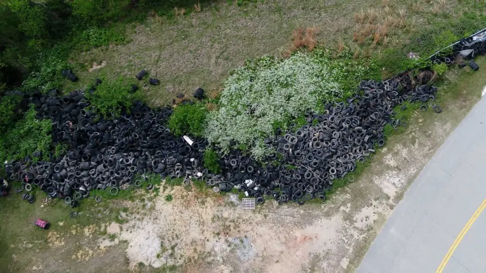 Savannah leaders approve more than $70K to remove long-standing tire pile on Hutchinson Island