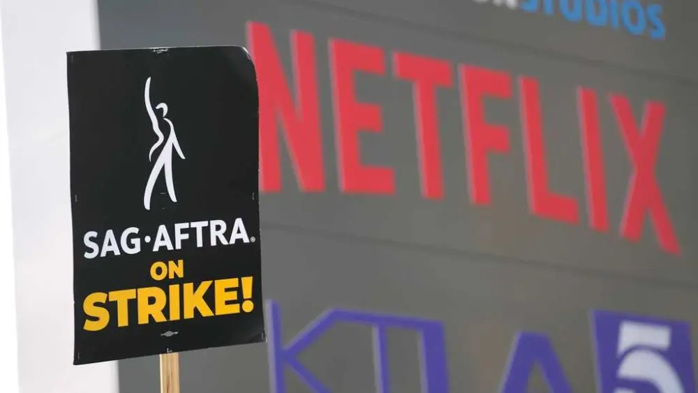 Screenwriters union and Hollywood studios reach four-year tentative agreement