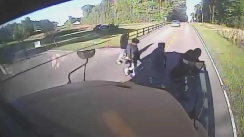 Caught on camera: Driver seen crashing into school bus, fleeing the scene