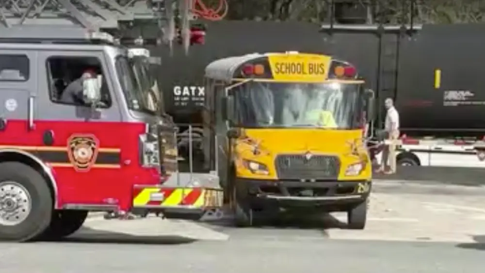 Florida school bus driver faces 29 counts of child neglect after close call with train