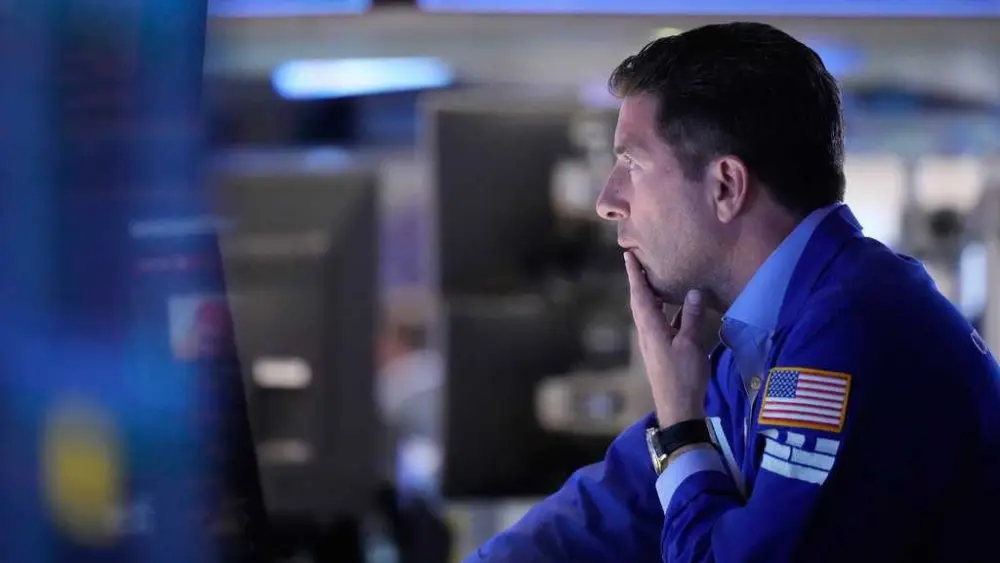 Wall Street hits an all-time high after adding to its weekslong rally