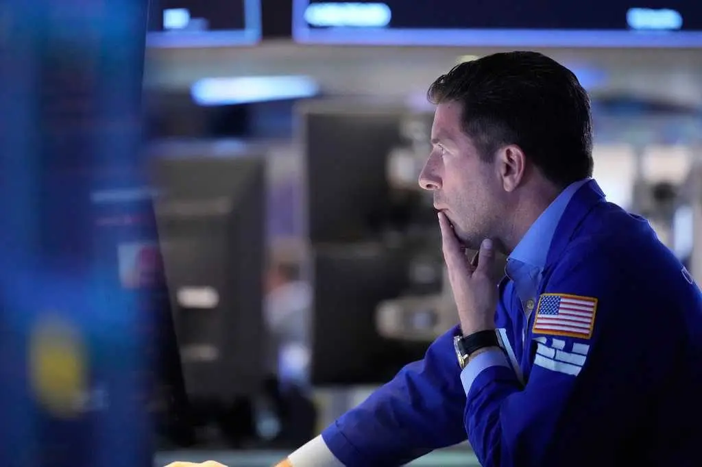 Wall Street hits an all-time high after adding to its weekslong rally