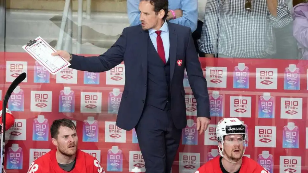 Hockey coach who admitted using a false COVID-19 vaccine certificate at the Olympics is fired