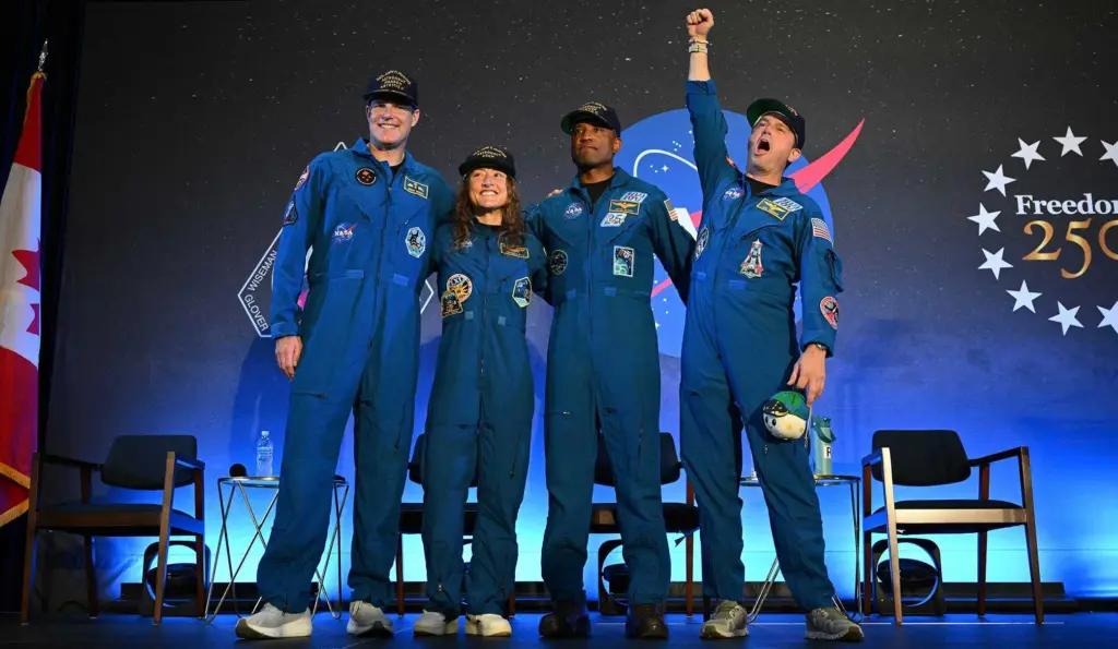 Artemis II astronauts answering questions about moon flyby mission