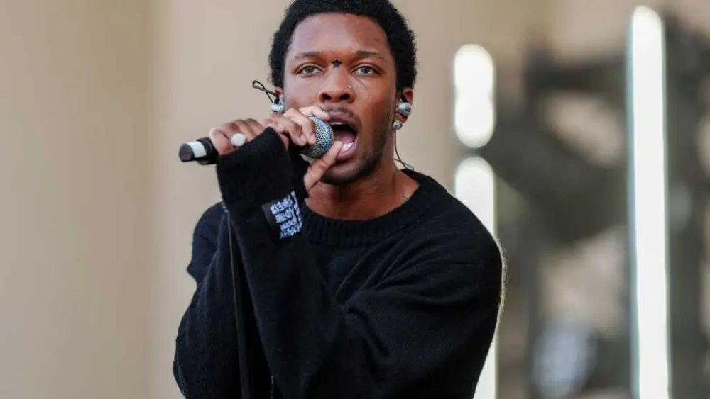 Singer D4vd arrested in connection with teen's death after body found in his Tesla