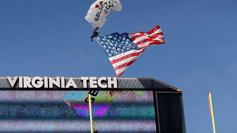 WATCH: Skydiver rescued after crashing into scoreboard before Virginia Tech game
