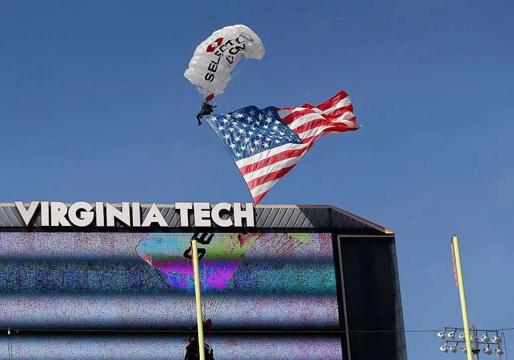 WATCH: Skydiver rescued after crashing into scoreboard before Virginia Tech game