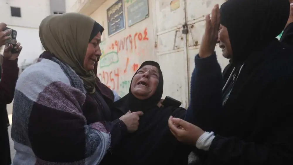 Palestinians hold funerals for pregnant woman, her children killed in Israeli strikes