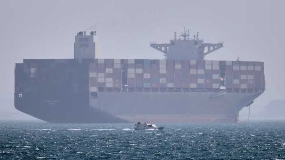 US claims progress in reopening the Strait of Hormuz, saying 2 merchant ships have transited