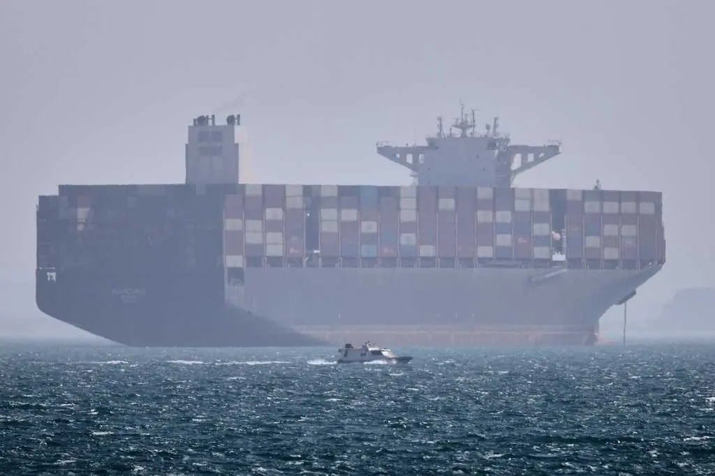 US claims progress in reopening the Strait of Hormuz, saying 2 merchant ships have transited