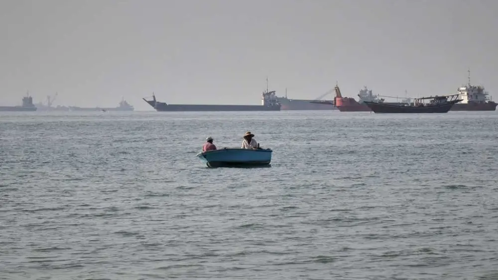 Tensions flare near Strait of Hormuz as a ship is seized and another is sunk