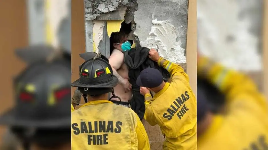 Burglary suspect rescued after being trapped inside wall void space for hours
