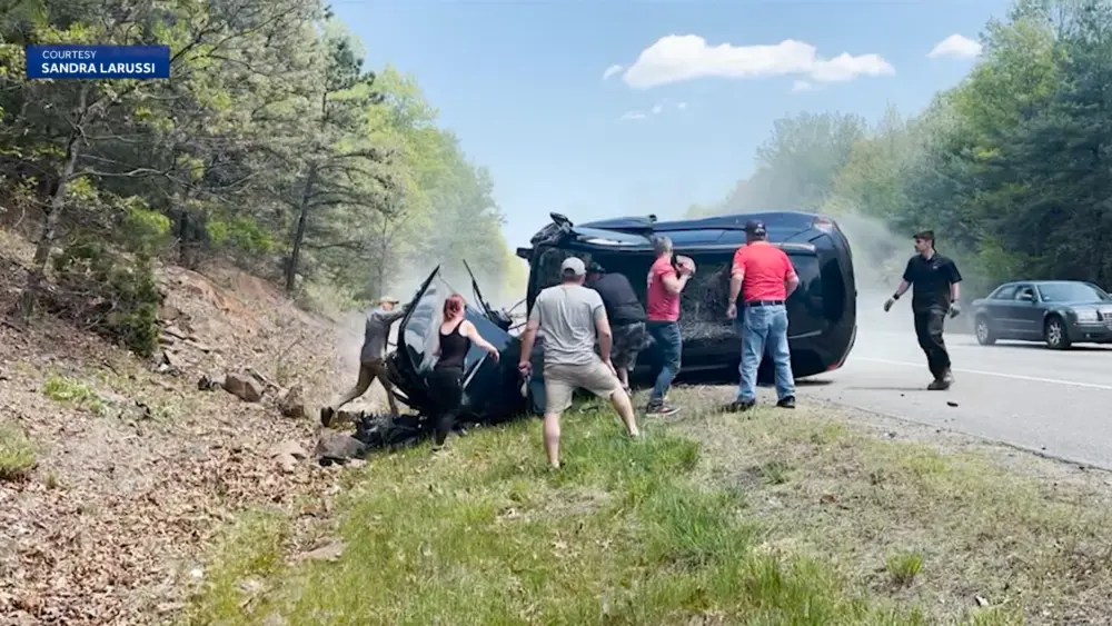 Video shows good Samaritans' efforts to rescue victims from fiery rollover crash