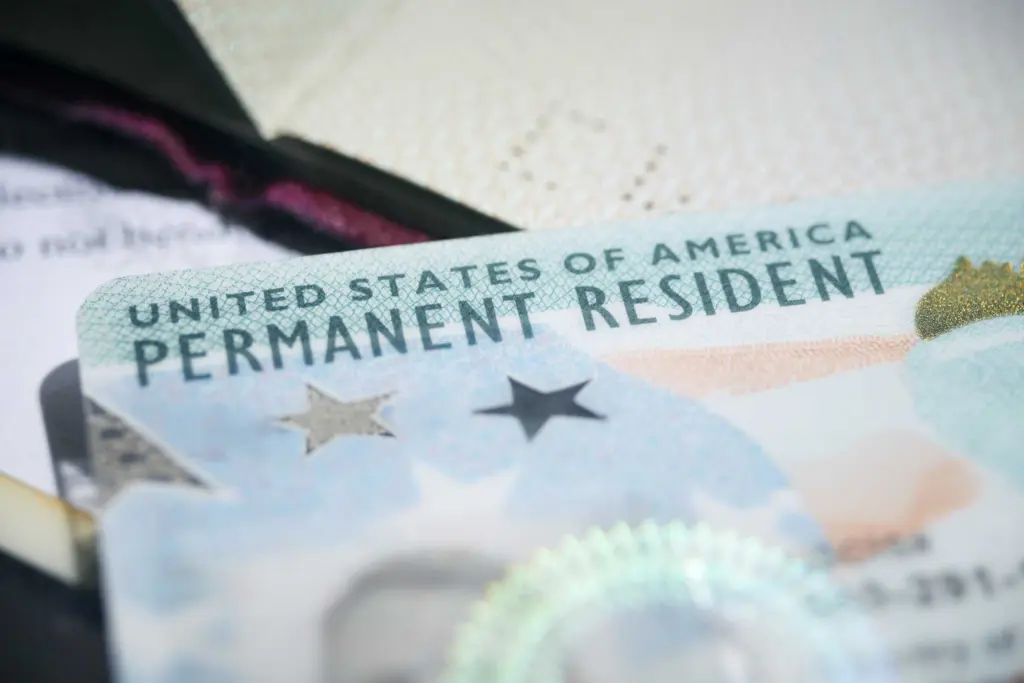 How is the Trump administration changing the green card application process?